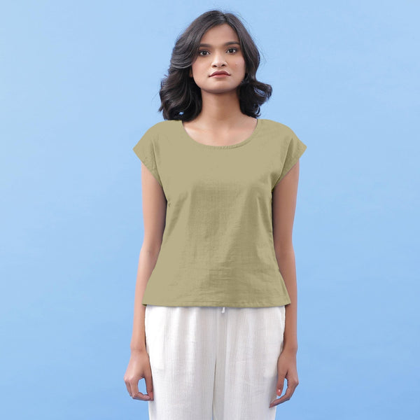 Front View of a Model wearing Khakhi Green Vegetable Dyed Handspun Cotton Essential Top