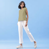 Left View of a Model wearing Khakhi Green Vegetable Dyed Handspun Cotton Essential Top