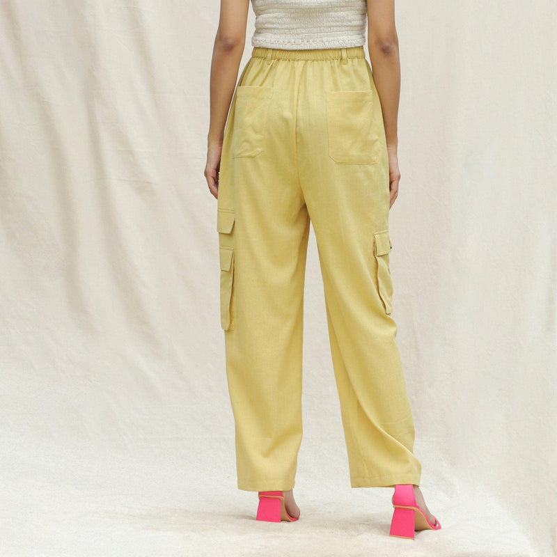 Back View of a Model wearing Khakhi Green Cotton Flax High-Rise Cargo Pant