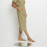 Right View of a Model wearing Mid-Rise Green Vegetable Dyed Cotton Culottes