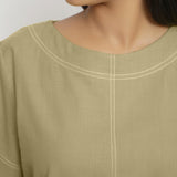 Front Detail of a Model wearing Vegetable-Dyed Green 100% Cotton Top