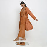 Left View of a Model wearing Vegetable-Dyed Khaki Orange 100% Cotton Paneled Overlay