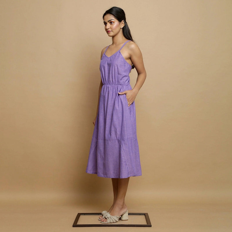 Left View of a Model wearing Hand-Embroidered Lavender Godet Dress