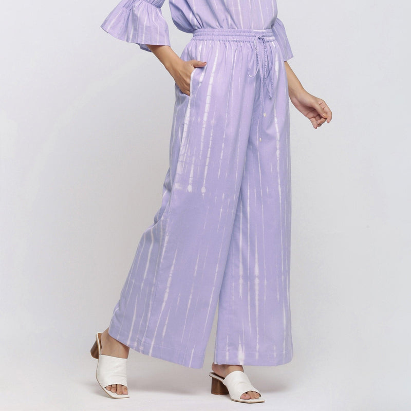 Right View of a Model wearing Lavender Tie Dye Wide Legged Palazzo Pant