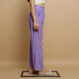 Left View of a Model wearing Lavender Ankle-Length Godet Pant