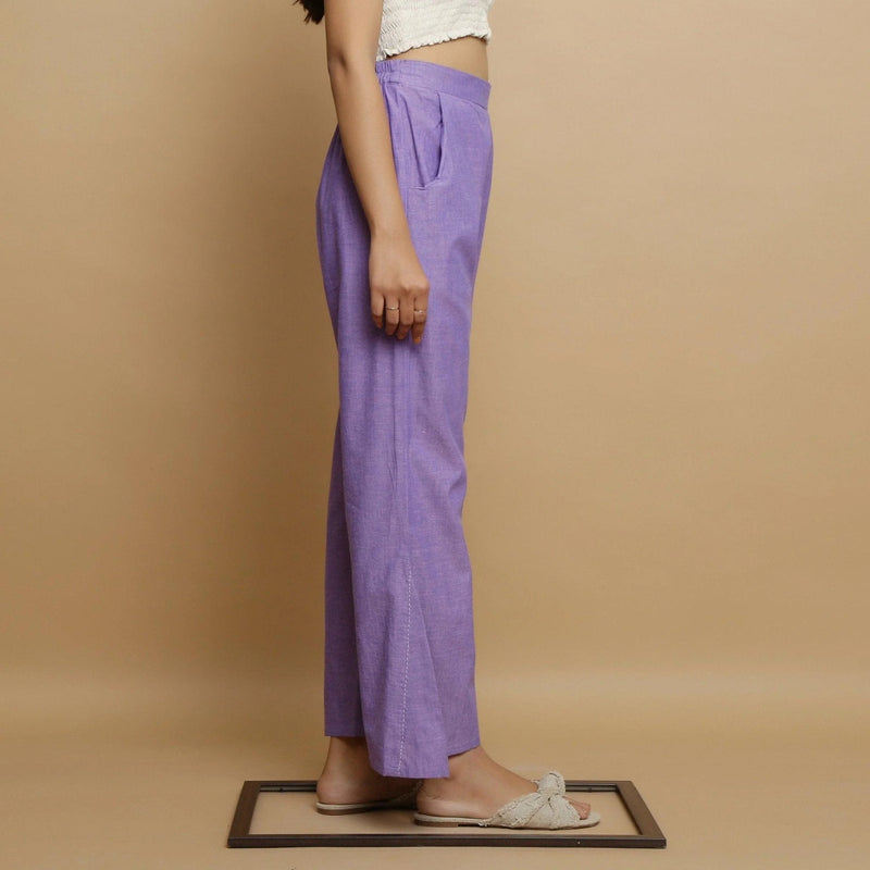 Left View of a Model wearing Lavender Ankle-Length Godet Pant