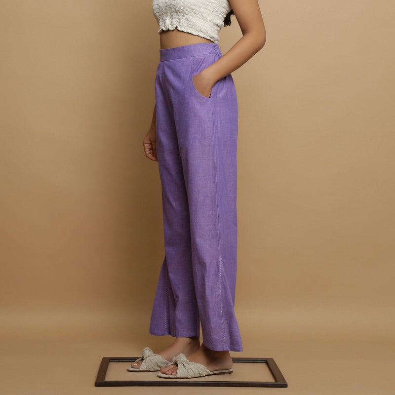 Left View of a Model wearing Lavender Ankle-Length Godet Pant