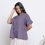 Left View of a Model wearing Lavender Round Neck Linen Loose Gathered Yoke Top