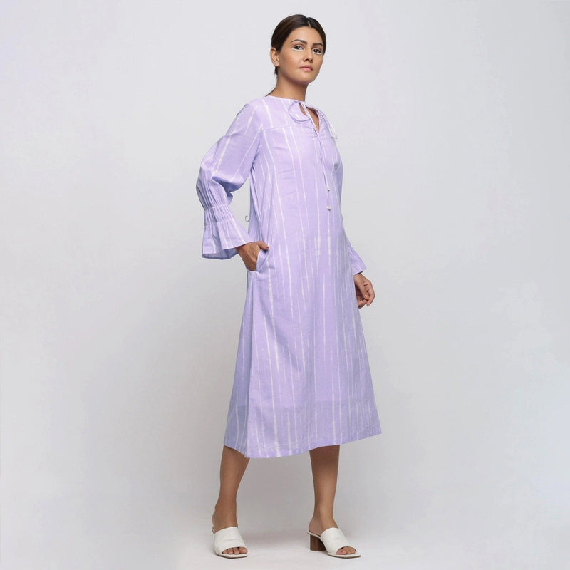 Right View of a Model wearing Poet Sleeves Cotton Lavender Yoke Dress