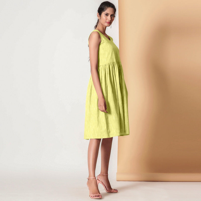 Right View of a Model wearing Lemon Yellow Gathered Yoke Dress