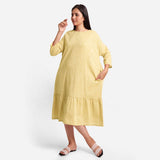 Front View of a Model wearing Lemon Yellow Yarn-Dyed 100% Cotton Tier Dress