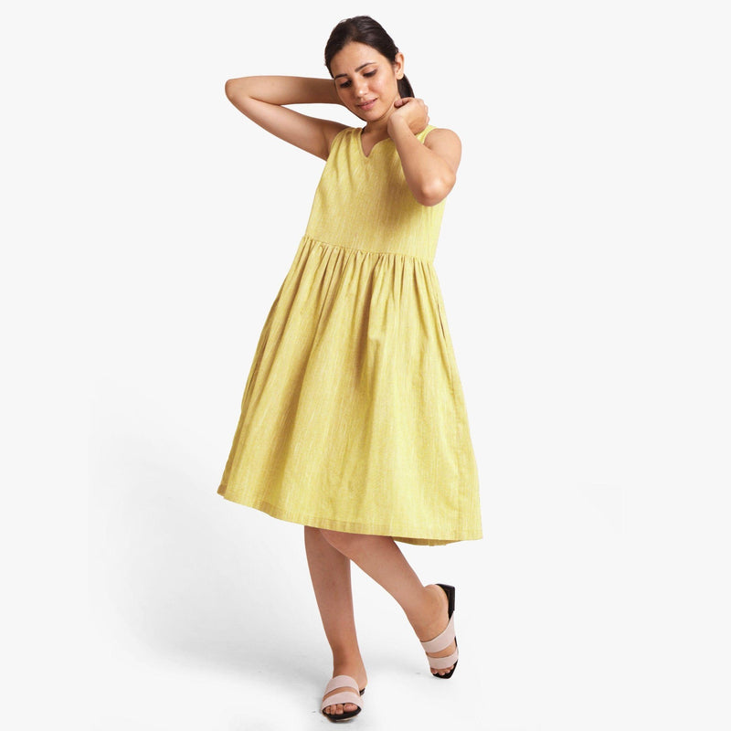 Front View of a Model wearing Yarn Dyed Cotton Lemon Yellow Yoke Dress