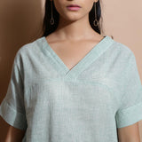 Front Detail of a Model wearing Light Green Cotton Straight Fit Top