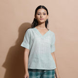 Front View of a Model wearing Light Green Cotton Straight Fit Top