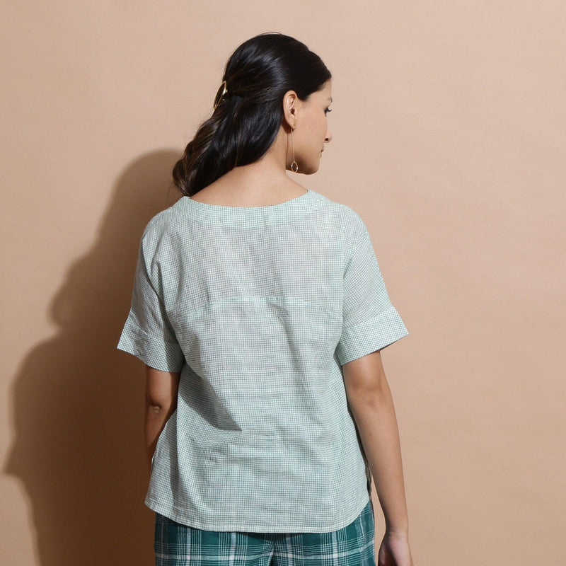 Back View of a Model wearing Light Green Cotton Straight Fit Top