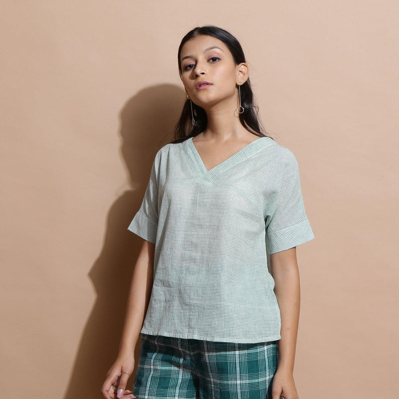 Front View of a Model wearing Light Green Cotton Straight Fit Top