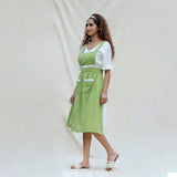 Left View of a Model wearing Light Green Cotton Flax Comfort Fit Apron