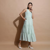 Right View of a Model wearing Handspun Cotton Muslin Checkered Dress