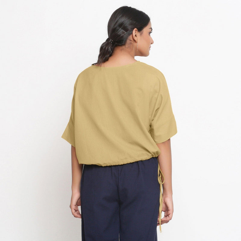 Back View of a Model wearing Light Khaki Cotton Flax Blouson Top