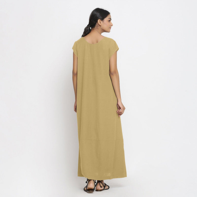 Back View of a Model wearing Light Khaki Cotton Flax A-Line Paneled Dress