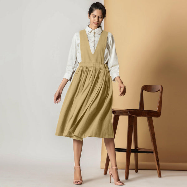 Front View of a Model wearing Light Khakhi Cotton Flax Pinafore Midi Wrap Dress