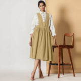 Front View of a Model wearing Light Khakhi Cotton Flax Pinafore Midi Wrap Dress