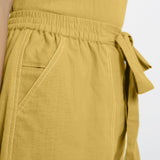 Front Detail of a Model wearing Yellow Vegetable Dyed Handspun Short Shorts