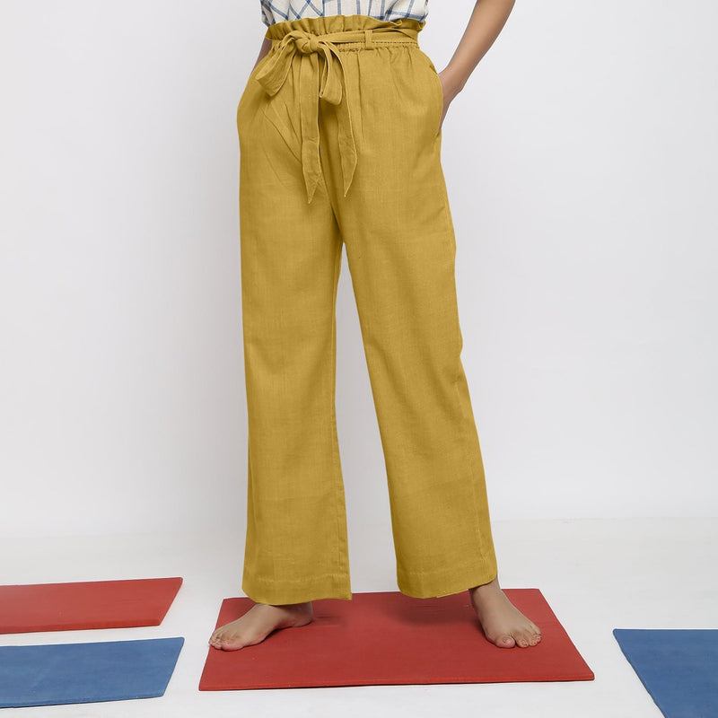 Front View of a Model wearing Light Yellow Vegetable Dyed Handspun Cotton Elasticated Wide Legged Paperbag Pant