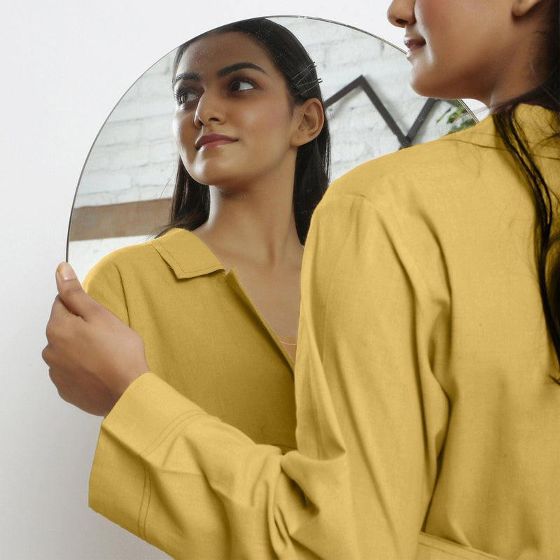 Front Detail of a Model wearing Vegetable-Dyed Yellow 100% Cotton Paneled Overlay