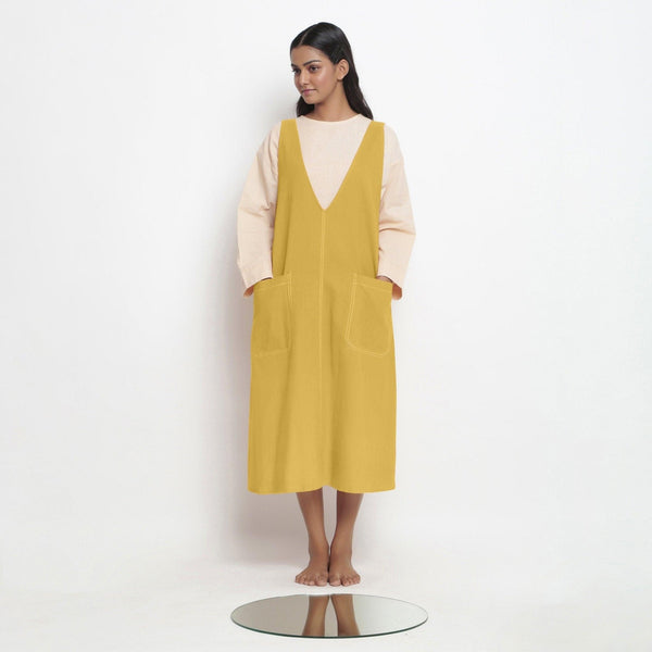 Front View of a Model wearing Light Yellow Handspun Cotton Deep Neck Shift Dress