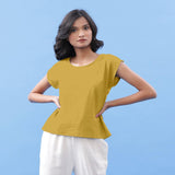 Front View of a Model wearing Light Yellow Vegetable Dyed Handspun Cotton Essential Top