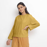 Front View of a Model wearing Yellow Vegetable-Dyed 100% Cotton Straight Top