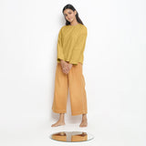 Front View of a Model wearing Yellow Vegetable-Dyed 100% Cotton Straight Top