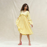 Front View of a Model wearing Light Yellow Handspun Cotton Bohemian Midi Dress