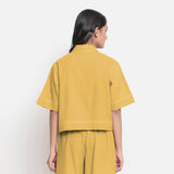 Back View of a Model wearing Rust Vegetable Dyed Handspun Cotton Shirt