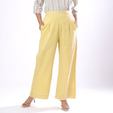 Front View of a Model wearing Handspun Light Yellow Wide Legged Pant