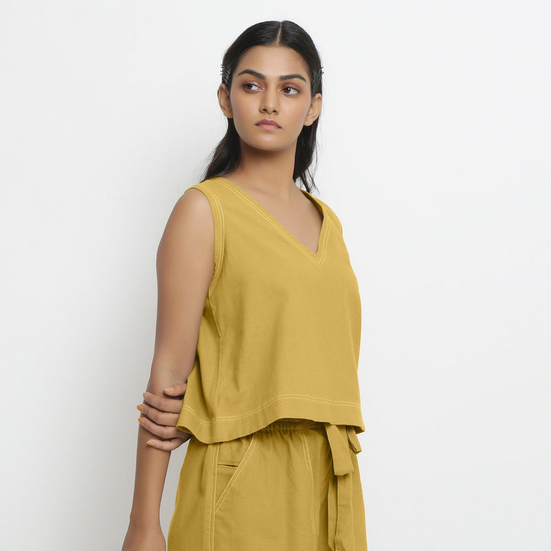 Right View of a Model wearing Yellow Handspun Cotton Vegetable Dyed Crop Top