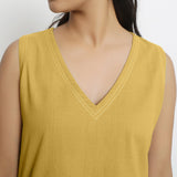 Front Detail of a Model wearing Yellow Handspun Cotton Vegetable Dyed Crop Top