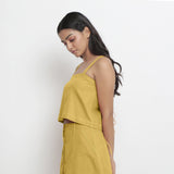 Left View of a Model wearing Vegetable-Dyed Yellow 100% Cotton Spaghetti Top