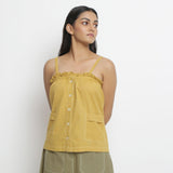 Front View of a Model wearing Vegetable Dyed Button-Down Camisole Top