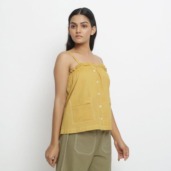 Right View of a Model wearing Vegetable Dyed Button-Down Camisole Top