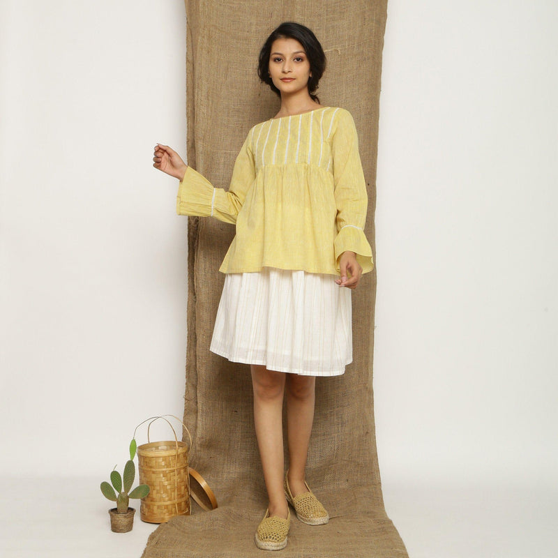 Front View of a Model wearing Handspun Light Yellow Poet Sleeve Top