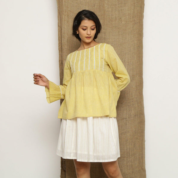 Front View of a Model wearing Handspun Light Yellow Poet Sleeve Top