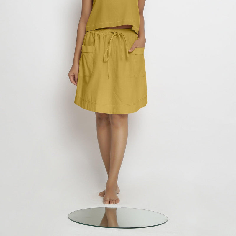 Front View of a Model wearing Vegetable-Dyed Light Yellow 100% Cotton Mid-Rise Skirt