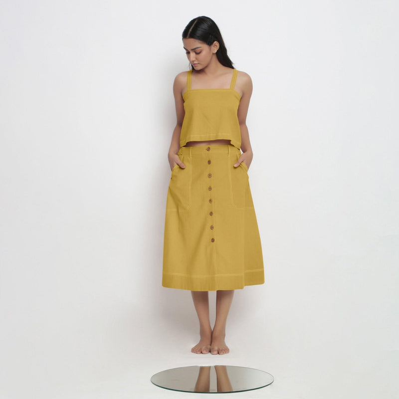 Front View of a Model wearing Yellow Spaghetti Top and Yellow Skirt Set