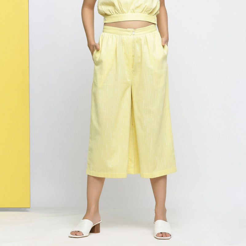 Front View of a Model wearing Light Yellow Yarn Dyed 100% Cotton Flared Culottes