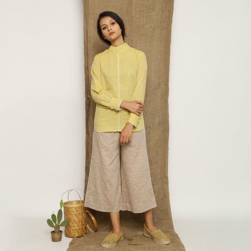 Front View of a Model wearing Light Yellow Handspun Halter Neck Top