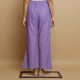 Back View of a Model wearing Lavender Ankle Length Godet Pant