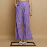 Front View of a Model wearing Lavender Ankle-Length Godet Pant