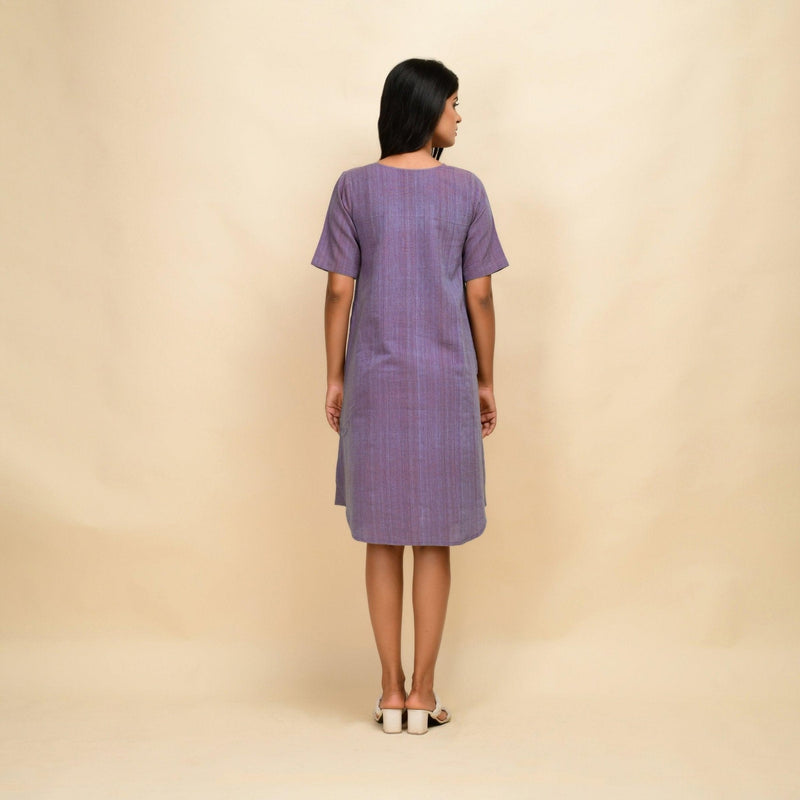 Back View of a Model wearing Lilac 100% Cotton Knee Length Dress